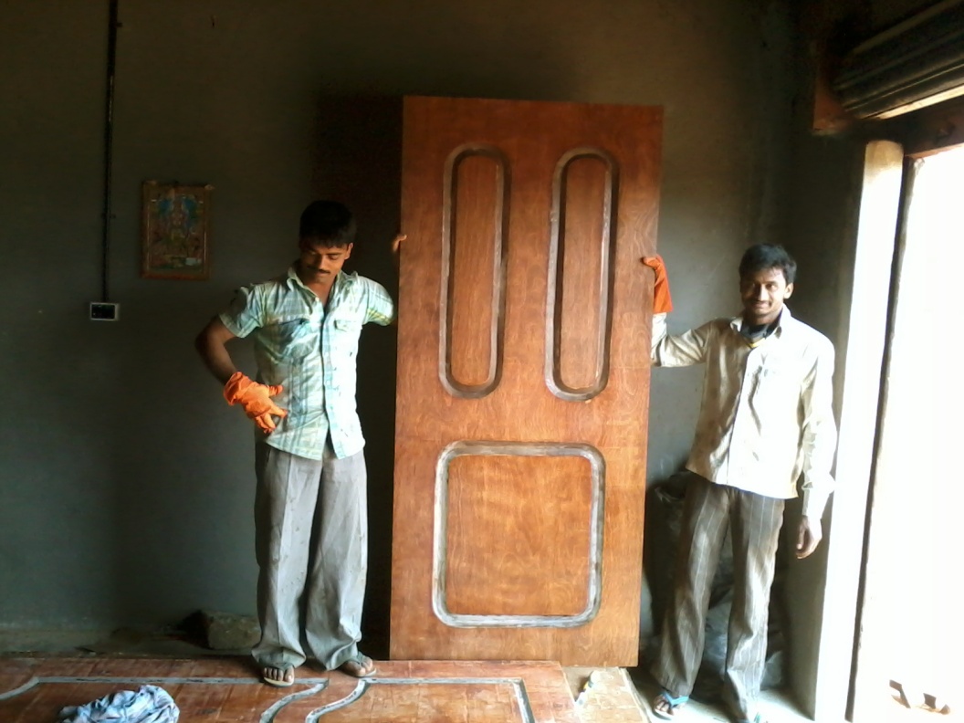 A MOLDED WOOD SUBSTITUTE DOOR