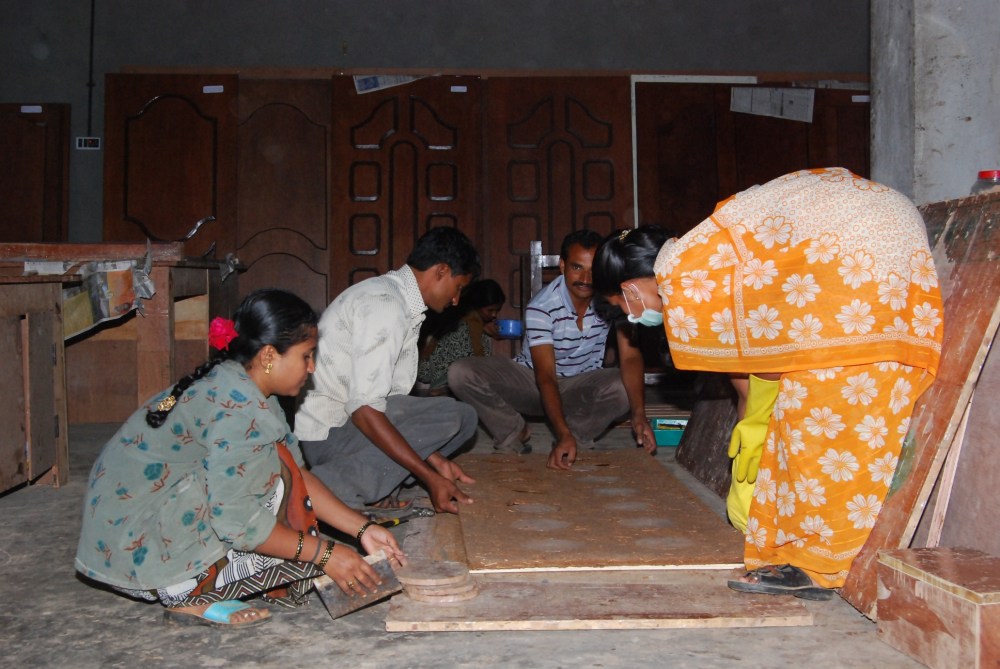 The Agrowastes Molded Board is being Removed from the Mold